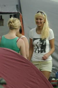 Blonde babe changing into and out of bikini and shows her tits