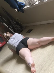 Chubby Wife in Spandex Mini-Shorts Lying on the Floor With Spread Legs
