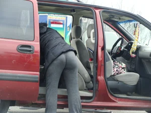 Girls cleaning their cars in jeans and pants