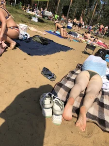 Hot Girl in a Swimsuit Pale Legs And Feet Photos at the Beach