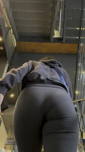 College Vpl Latina In Dark Grey Leggings Going Up The Stairs