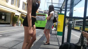 Hot brunette showing her ass cheeks in tiny shorts
