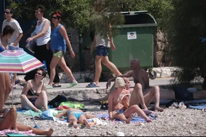Nude girls on a beach in Hvar, Croatia