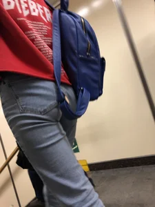 Teen in Blue Jeans Subway Candid