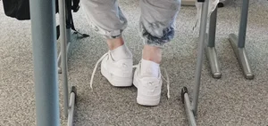 Candid girls socks shoeplay in school