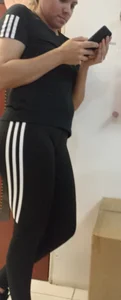 Beautiful blonde girl with amazing big ass in black adidas leggings, with a small camel toe [OC]