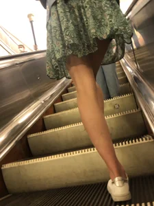 Girl in a Skirt With Thin Legs Standing on a Subway Escalator Low Angle Creepshots Collection