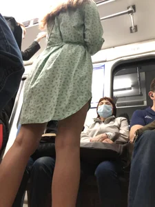 Girl in a Dress With Sexy Legs in Subway and on a Street