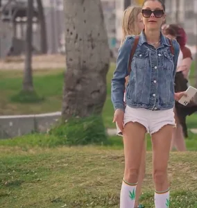 Couple of hot and cute girls in mini-shorts on rollerblades park creepshots