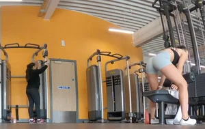 Gym brunette in tight grey shorts