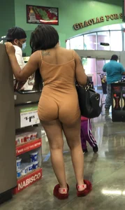 Latina with hard nipples and a big booty in tight spandex shorts outfit