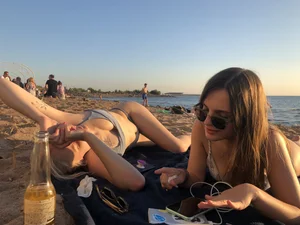 Hot Candid Girls In Swimsuits Lying on a Beach Together