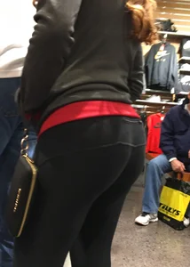 Pretty girl shopping with boyfriend in leggings with a nice ass