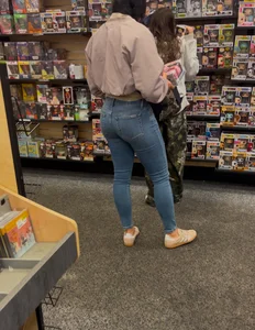 Milf in tight jeans at the mall