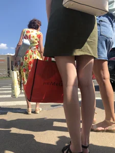 Hot girl in short dresses and skirts on the crosswalk street creepshots
