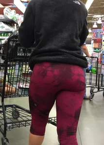 Milf grocery shopping in red leggings with a great ass