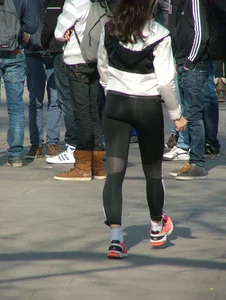 Girl with a nice booty out for a walk in tight Adidas leggings