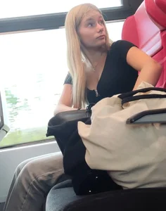 Hot busty blonde on train