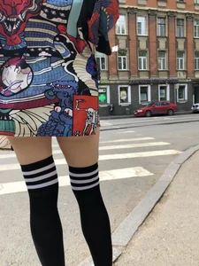 An Anime Fan Teen in a Short Skirt And Stockings Bending Over on the Crosswalk Street Creepshots