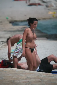 3 amazing topless girls on a nudist beach