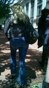 Blonde in tight jeans with her red thong sticking out