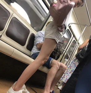 Cute Teen Girl in Shorts in Subway Train Candid Photos