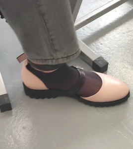Closeups of a Candid College Teen's Feet in Black Pantyhose And Boots, Sitting in Class