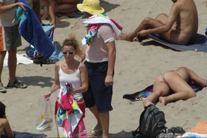 Girls on a nude beach in Sitges, Spain