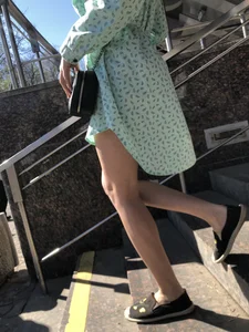 Girl in a Dress With Sexy Legs in Subway and on a Street