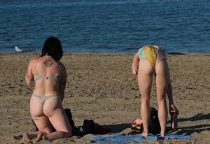 Ladies literally making out on beach