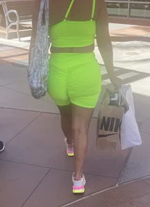 Latina in spandex shorts + other girls
