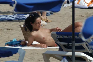 Girls on a nude beach in Sitges, Spain