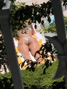 (OC) Blonde girl tanning poolside