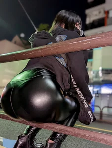 Big booty in leather - sexy candid girl sitting on the fence on the street creepshot