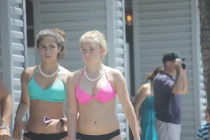 Even more sexy Florida bikini babes including a midget in a bikini