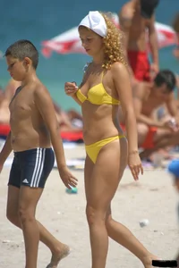 A bunch of sexy beach voyeur babes in bikinis, thongs and topless