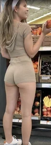 Perfect booty in mini shorts at the supermarket