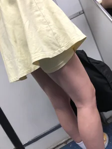 Candid Girl in a Yellow Skirt With Nice Slim Legs Subway Train Creepshots