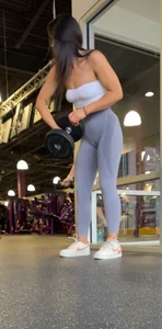 Gym brunette with a deep camel