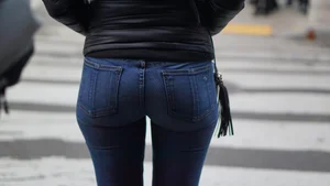 Brunette lady in tight jeans with a great ass