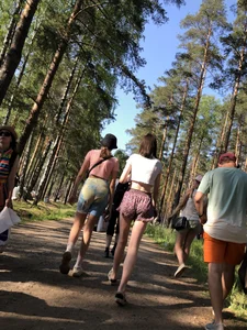 Skinny Teens in Shorts and a Top Walking on a Forest Road Photo Gallery
