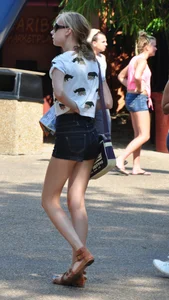 Skinny blonde chick in little denim shorts