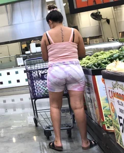 Thick Latina babe with a nice ass in tight patterned shorts