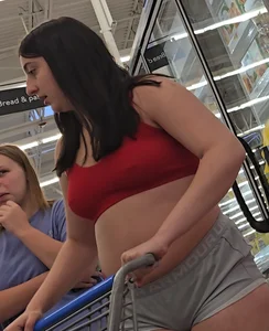 Thickish, nipple-pierced, trashy girl showing her ass for the boys