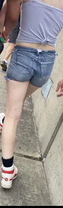 Tight ass in grey jean shorts.