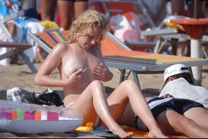 Girls on a nude beach in Bibione, Italy