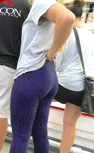 Blonde ass grocery shopping in blue and black leggings