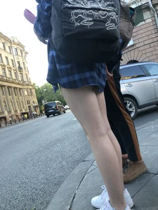 Candid teen with hot slim legs at the crosswalk street creepshots
