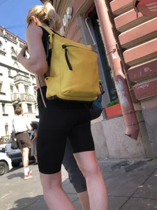 Hot candid blonde wearing spandex shorts with awesome slim legs