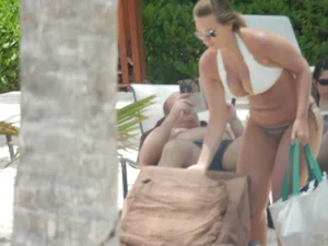 Bikini babe at the beach with nice tits and ass